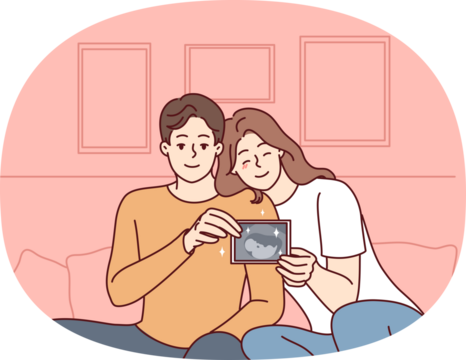 Smiling couple showing baby ultrasound
