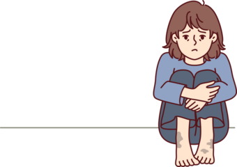 Sad poor girl with dirty feet sits on floor and is sad because of lack of home and money for food