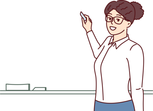 Woman teacher stands at blackboard and uses chalk, teaching elementary or high school children