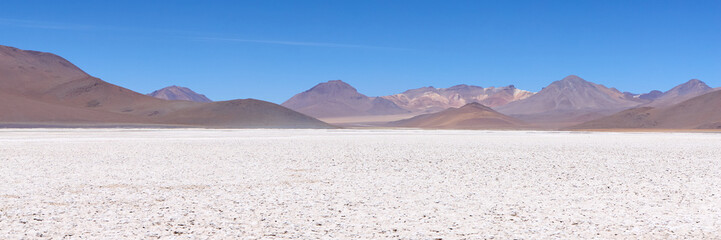 Bolivia, Avaroa National Park. Desert and mountain range on the horizon.