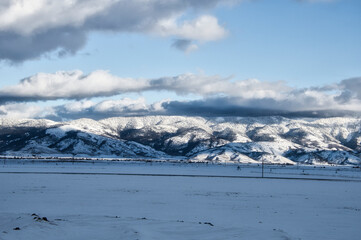 Snowy mountain range on a gloomy day