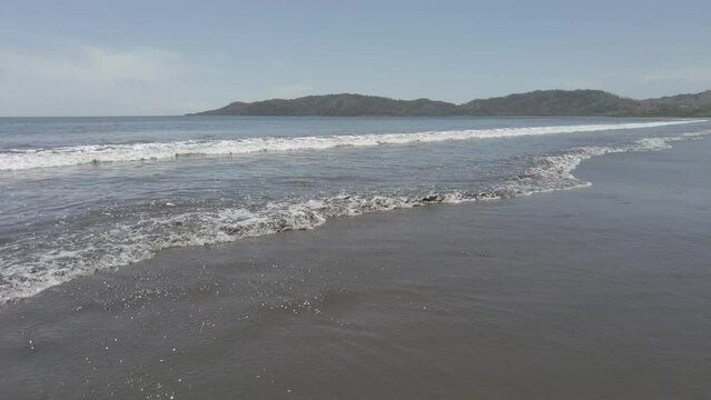 Beautiful view of sea waves at Tambor beach, Costa Rica