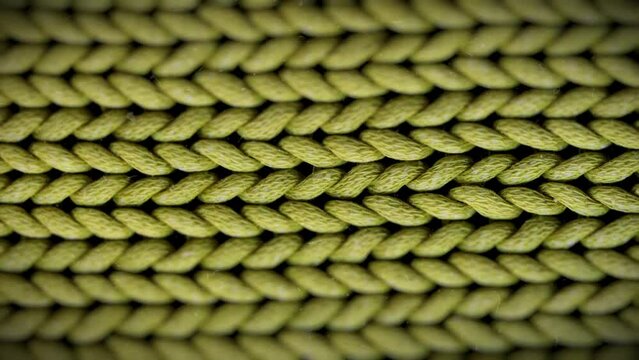 Details of knitted woolen fabric stop motion macro