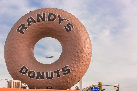 Inglewood (Los Angeles) California: Randy's Donuts with a giant doughnut on the roof . Famous Building, located in Inglewood, California, near Los Angeles Airport, designed by Henry J. goodwin