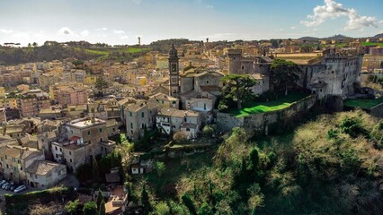 Fototapeta na wymiar Drone shot of the Orsini-Odescalchi castle and other buildings In Bracciano, Lazio, Italy
