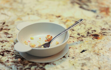 hand-washing dishes, symbolizing equality and shared responsibilities of men and women gender roles responsibilities. Hand washing vs dishwasher technological advances 