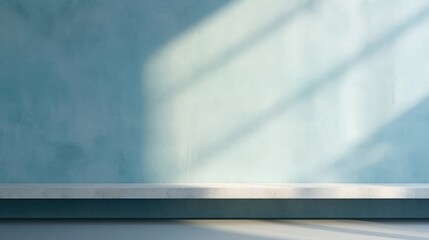 Abstract light blue background, perfect for product presentations. Shadows and light from the window on the cement wall Morning light enters through the diagonal window.