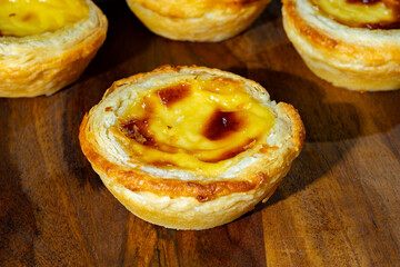 Portugal's traditional sweet dessert Pastel de nata egg custard tart pastry in cup