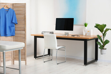 Modern medical office with doctor's workplace in clinic