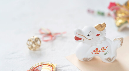 Japanese new year material. Zodiac dragon and new year decorations on white background....