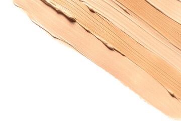 Samples of skin foundation on white background, top view. Space for text