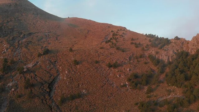 Sunrise on Mountain Descending Drone Shot