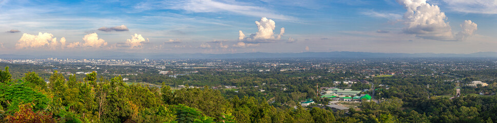 Panorama view of Chiangmai Chiang Mai city taken from Doi Suthep Mountains. Lovely views of the Old city at Sunset Sunrise lovely tropical mountains and beautiful nature in the foreground - obrazy, fototapety, plakaty