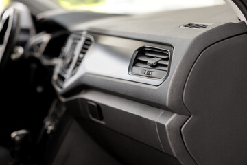 Air vent and airbag module in car, closeup