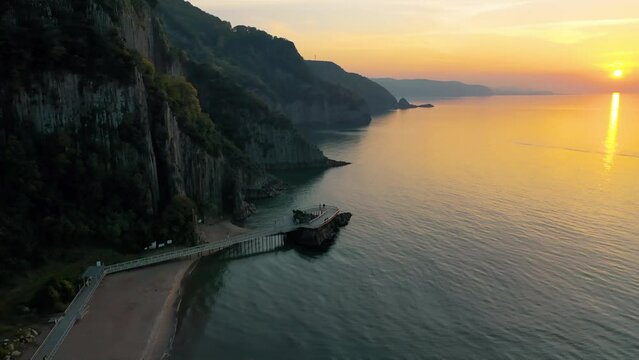 Lava landscape and the Black Sea. Guzelcehisar is famous for its lava basalt columns. The columns were viewed with a drone at sunset. Amasra, Bartin, Turkey