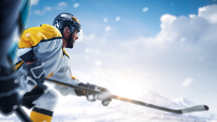 Hockey close up. Professional hockey players playing hockey on a rink in mountain. Sport emotion....