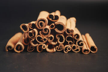 Cinnamon sticks on a black background 