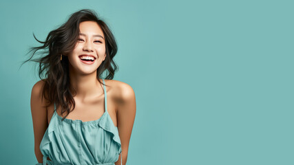 Asian woman model wear a blue sundress isolated on pastel background - obrazy, fototapety, plakaty
