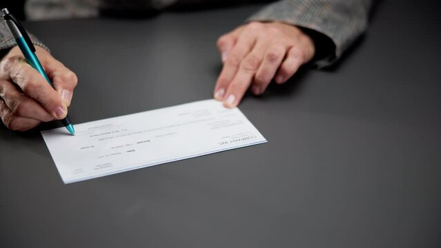 Confident Woman Writing Signature