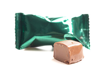 Green Foil Wrapped Chocolate Truffles on a White Background