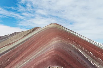 Papier Peint photo Vinicunca Vinicunca, Peru - September 17: Breathtaking view of the Seven Color Mountain, where vibrant hues harmonize with the sky. An impressive capture of nature by datsphotoadventures.