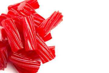 Traditional Red Licorice Pieces Isolated on a White BackgroundRed Licorice Pieces Isolated on a...