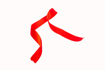 Abstract shaped red ribbon isolated on white background.