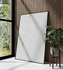big wooden frame mockup poster leaning on the wooden panel wall with interior plant decoration