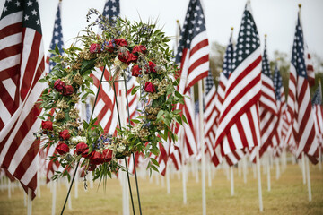 Military wreath and American flags display on Veterans Day