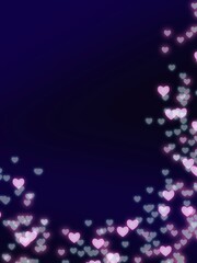 Pink bokeh heart shape on black background 