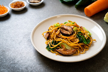 yakisoba noodles stir-fried with vegetable in asian style - vegan and vegetarian food