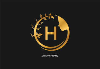 Beauty logo initial letter H with golden style color and leaf. Natural beauty logo template