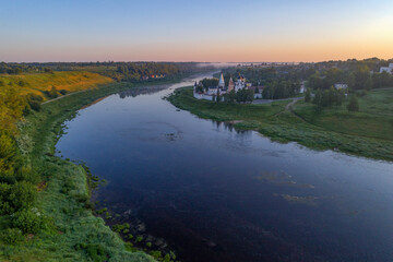 Sunrise over the Holy Dormition Monastery. Staritsa, Russia (aerial photography)