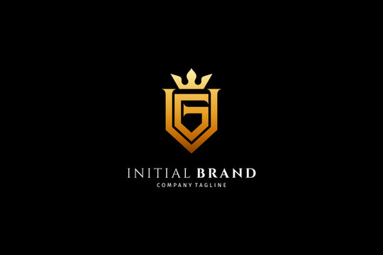 initial GV monogram letter logo luxury shield design with gold crown combination