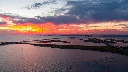 Fototapeta premium Mobile Bay causeway and the Jubilee Parkway bridge at sunset
