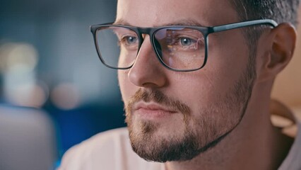 Businessman analyzing stock market. Eyeglasses reflection of trading platform. Thoughtful investor guy touch chin when analysis how much money he lost in trading. Expert crypto trader watching bear