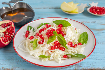 Cabbage Pomegranate Salad for Jewish holiday Rosh Hashanah.