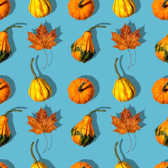 seamless pattern different pumpkins on a blue background