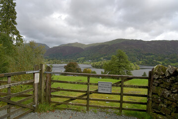 Fototapeta na wymiar Wooden gate above the lake at Grasmere in the Lake District