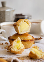 Pasticciotto leccese pastry filled with egg custard cream on a napkin close up