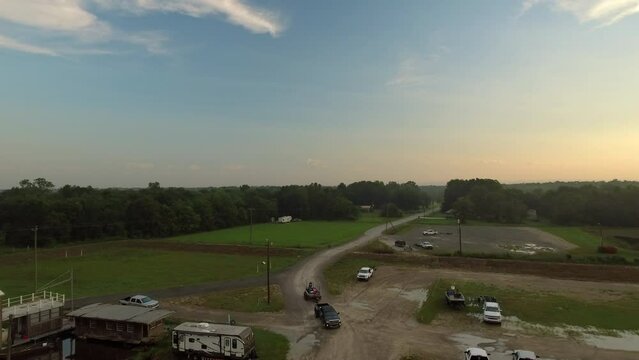 Aerial Panning Shot Of Towing Pickup Truck Moving On Road - Bayou, Louisiana