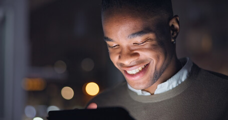 Businessman, night and reading with smile on digital tech, email with career progress in company. Black man, happy and touchscreen for online project growth, bokeh and feedback on startup expansion - obrazy, fototapety, plakaty