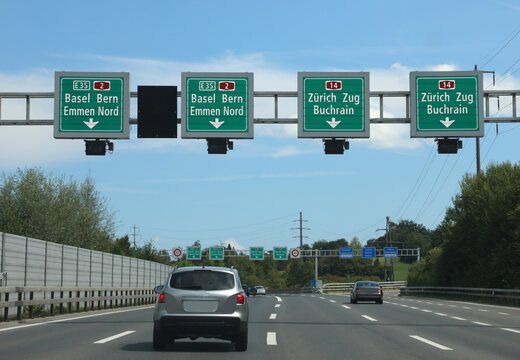 speed detector and payment of the motorway vignette with road signs with indications of many locations in Switzerland