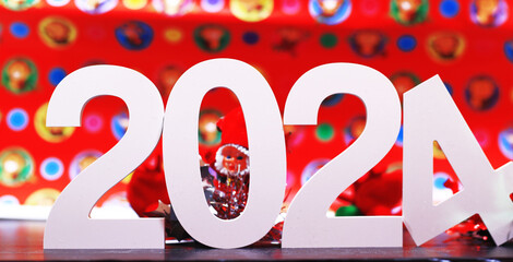Wooden letters that indicate the festival to welcome the happy new year 2024.