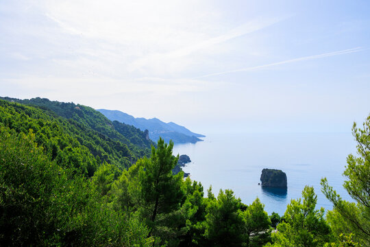 Coast and lonely rocks in the sea near Sinarades on the island of Corfu