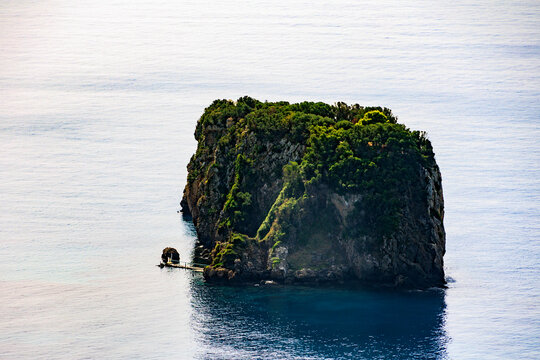 Coast and lonely rocks in the sea near Sinarades on the island of Corfu