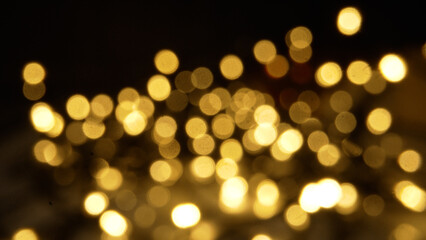 New Year's background made of lights. Beautiful background of retro light bulbs out of focus.