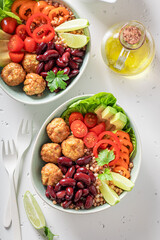 Spicy Mexican salad with meat, vegetables and groats.