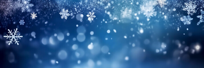 Fototapeta na wymiar Falling snowflakes on a blue background. Winter background. Banner.