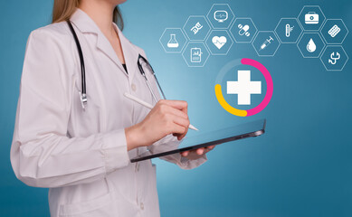 Medicine doctor using tablet with health icons on virtual screen. Digital healthcare, medical technology, internet network connection, global health network, online health, telemedicine concept.